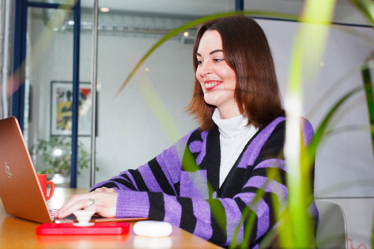 A life coach on a client call using the Wheel of Life downloaded from The Leap's free printable Wheel of Life Coaching Template.