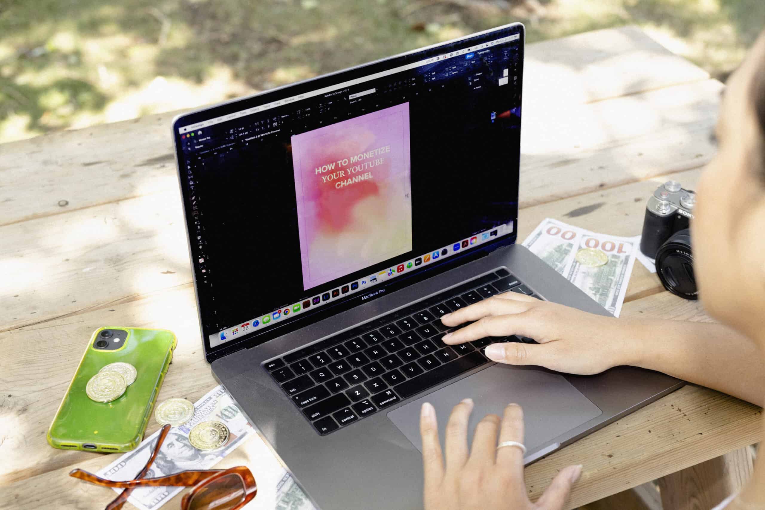 A photo of a creator building a landing page on a laptop, representing a list of the best landing page builders.